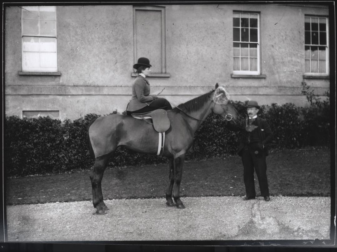 Woman on horse vintage photo